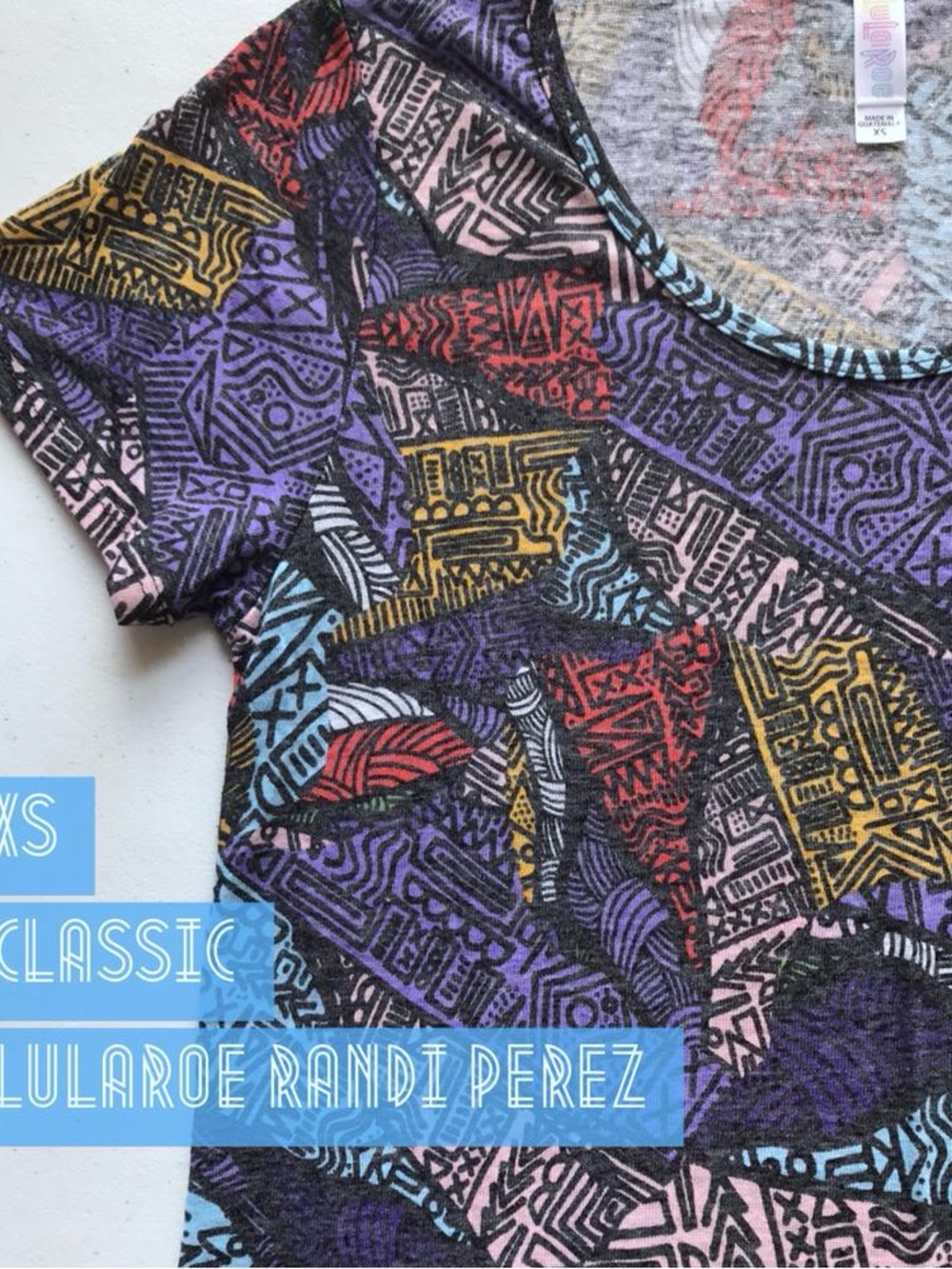 LuLaRoe Short Sleeve Tee in Purple, Pink, Blue & Gold Geometric Print